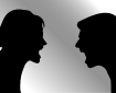 Silhouet af kvinde og mand der skændes